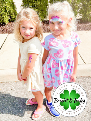 Smiling face with a custom face paint design: ocean friends.